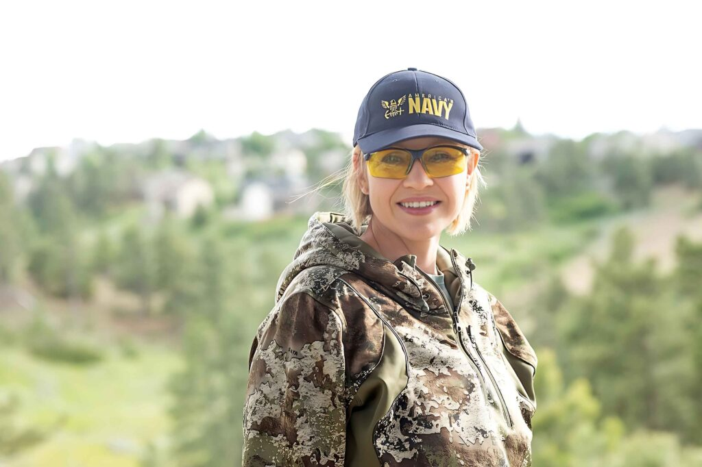 Kerri Seekins-Crowe sporting a U.S. Navy cap.